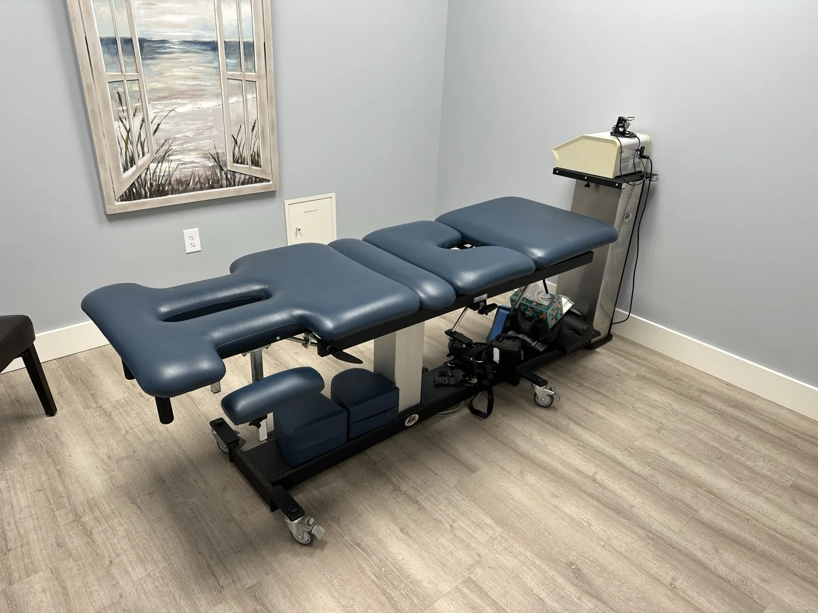 Spinal decompression table in a treatment room at Lakeside Sports Chiropractic + Physical Therapy